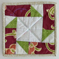 Raspberry Green Pinwheel Potholder by Quilts by Anne 8" X 8"