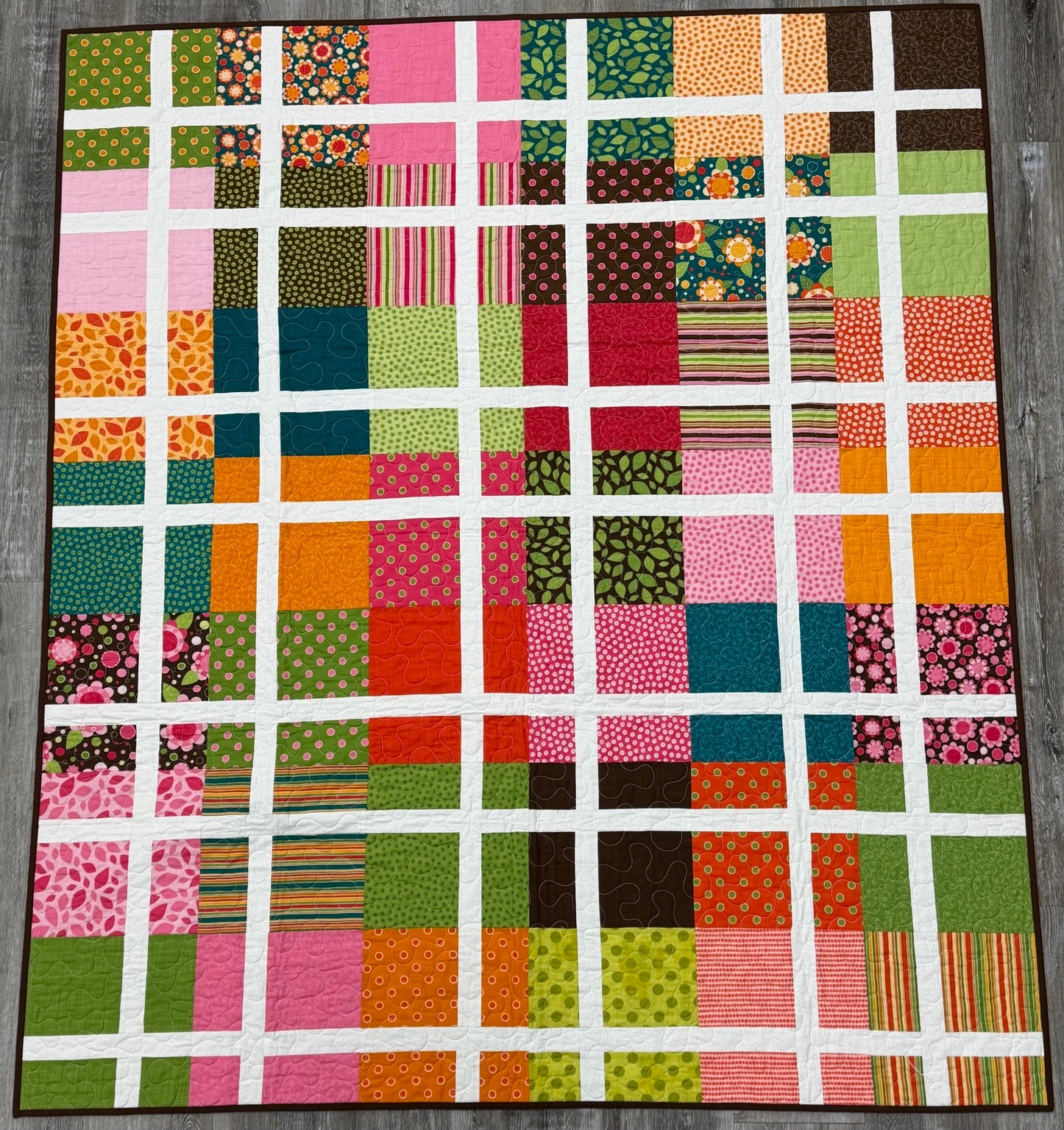 Bright Patchwork Lattice Quilt by Sew Sassy 70" X 60"